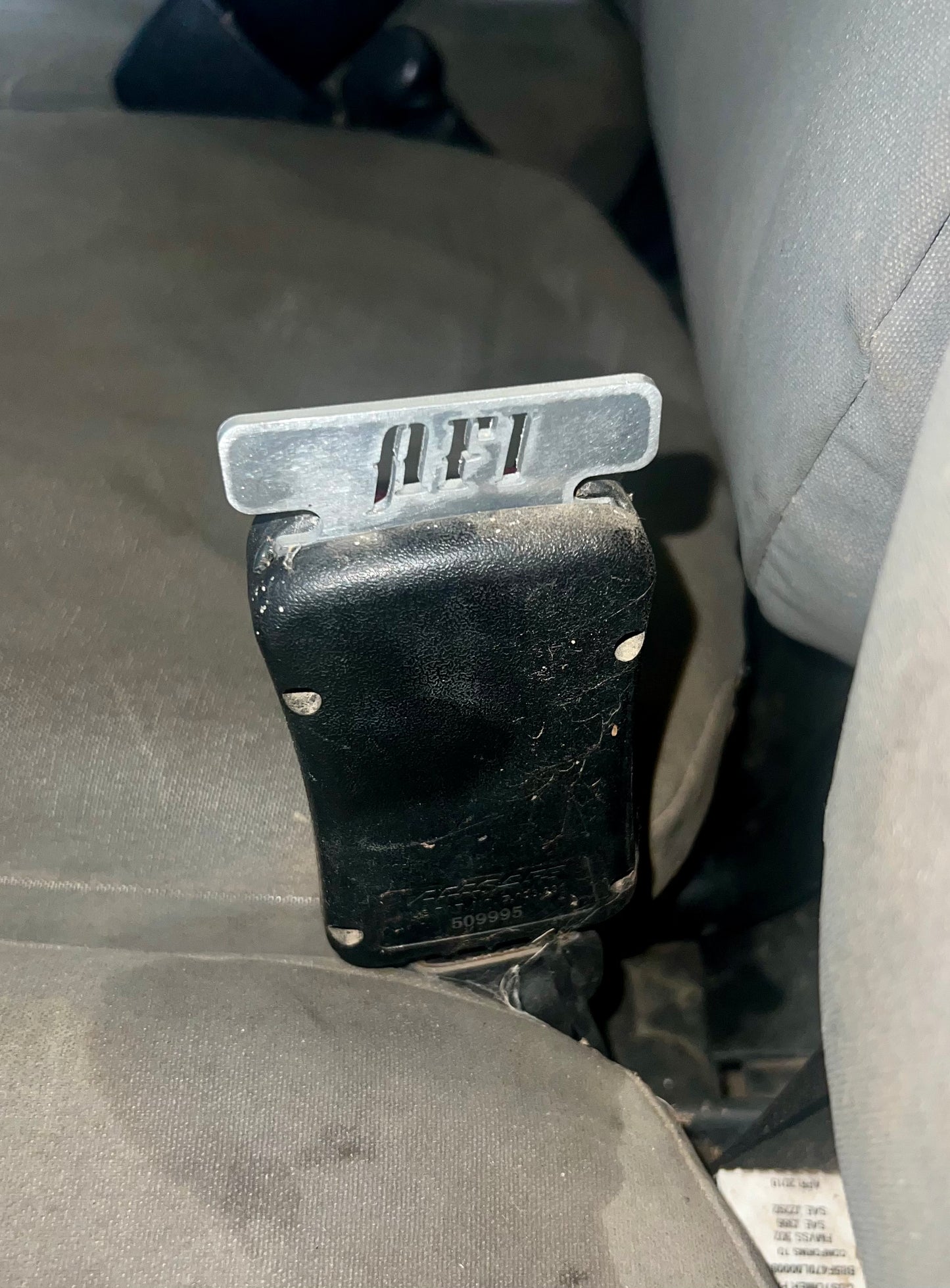 Buggy seat belt clip